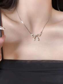 一款创意十足、小众、简约、百搭的休闲蝴蝶结吊坠，适合搭配女士项链。 - 多色2 - 查看 2