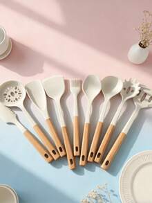 The Upgraded White Silicone Kitchenware Set Of Nine Pieces (Including A Strainer, Spatula, Scraper, Etc.) Is Heat-Resistant And Has A Non-Stick Coating. It Is Suitable For Operations Such As Stir-Frying, Serving, Mixing, And Brushing.