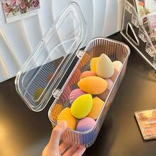 1个带盖塑料化妆品收纳盒 - 透明化妆品收纳盒，适用于化妆刷、美妆蛋、粉扑 | 防尘、便携、耐候、非电动立式支架