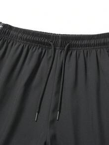 女士夏季休闲运动短裤，抽绳腰带，带口袋，独特的撞色设计，时尚美观，适合日常休闲穿着、跑步、骑行、球类运动、健身和其他运动。 - 黑色 - 查看 2