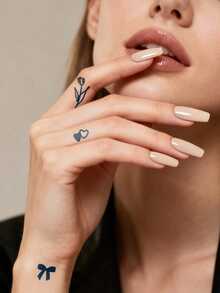 Herbal Juice Semi-Permanent Magic Finger Style Tattoo Sticker. Minimalist Tattoos. Romantic Texture Tulips, Double Hearts, Stars, Bowknot Patterns. Cute Small Fresh Pattern Tattoo Sticker. Daily Party Festival Gift. Shoulder, Neck, Arm, Finger, Earlobe, Back Of Leg, Collarbone, Body. Old School Tattoos. Semi-Permanent Tattoo. Waterproof. Long-Lasting Temporary Tattoo Sticker. Tattoo Sticker. Fake Tattoo. 1 Pack. - Blue - View 3