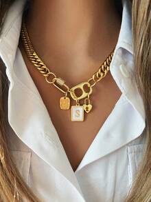 1 pieza Collar dorado muy elegante, adecuado para mujeres que les gusta usar cadenas gruesas. Tiene una hebilla ovalada con diamantes incrustados y una hebilla de estilo lata, equipado con un colgante con inicial y un candado con forma de corazón. Es vanguardista y de moda, adecuado para regalar o usar en lugares exclusivos - Dorado - Ver 27