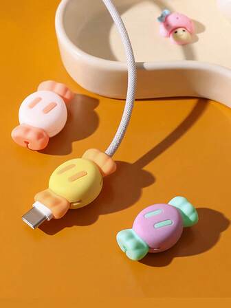 2 piezas (color aleatorio) Funda protectora de cable de carga de silicona con diseño de caramelo, protector de cable de carga antirrotura 2 en 1