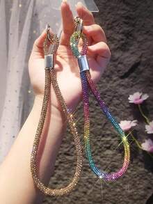 1条彩色水钻腕带挂绳，男女通用情侣款，耐用短款单扣手机挂绳，适合户外、旅行、运动、办公、学校、海滩、泳池等场合，兼容苹果、三星等手机，也可用于挂钥匙、身份证、零钱包、笔、蓝牙耳机、背包等，日常使用（带透明挂件）。兼容安卓及大多数智能手机，是送给母亲、家人、朋友、孩子、生日、节日的理想礼物。 - 彩色 - 查看 6