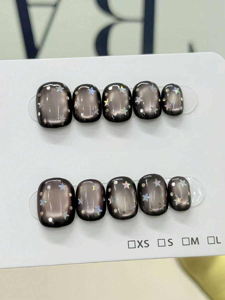 10 móng giả thủ công nguyên chất, móng ngắn, móng oval, móng đen, phong cách ngọt ngào, cá tính, tối giản, màu đen với điểm nhấn mắt mèo bạc, ngôi sao lấp lánh, móng giả mộng mơ dành cho phụ nữ và bé gái, thích hợp cho mùa xuân, hè, thu, đông, lễ hội, tiệc tùng và sử dụng hàng ngày. - màu đen - Xem 1