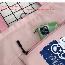 1个史努比学生帆布单肩包，樱桃红设计，适合作为节日礼物、生日礼物、情人节礼物、课本收纳包、返校礼物