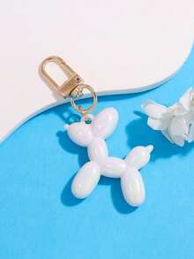 1个银色星星气球小狗钥匙扣 - 时尚手提包、背包和钱包配饰，配有心形吊坠和可调节扣环，可作包包挂饰钥匙圈、汽车钥匙链，是送给女性的独特礼物，适合生日和节日。