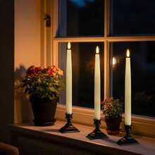 GenSwin Christmas Window Candles 4 Pcs Battery Operated Window Candles with Remote Timer Waxy LED Flameless Taper Candlesticks with Black Holder for Christmas Holiday Home Decor Ivory 0.78x12.6 - como en la foto - Ver 2