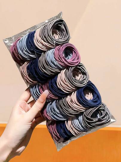 300个/套 柔和色系发圈，包含深蓝、浅粉、灰色、棕色等多种颜色，适合女孩、女士和男士使用。高弹力设计，反复拉伸不变形，牢固固定发型。适合日常通勤、运动、健身或休闲聚会，轻松打造时尚整洁的发型。 （关键词：发圈、发绳、发圈、发绳、发饰、弹力带、美发家居饰品）