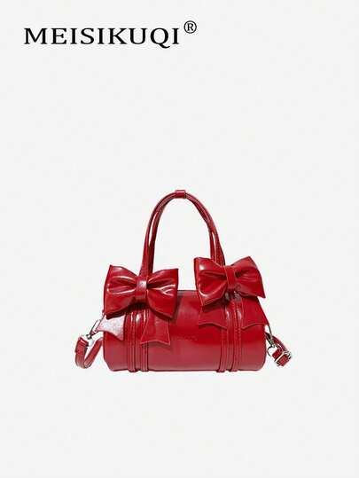 2025 Nuova borsa a cilindro con fiocco rosso alla moda, borsa Boston leggera e di lusso, adatta per giovani ragazze per viaggi e raduni