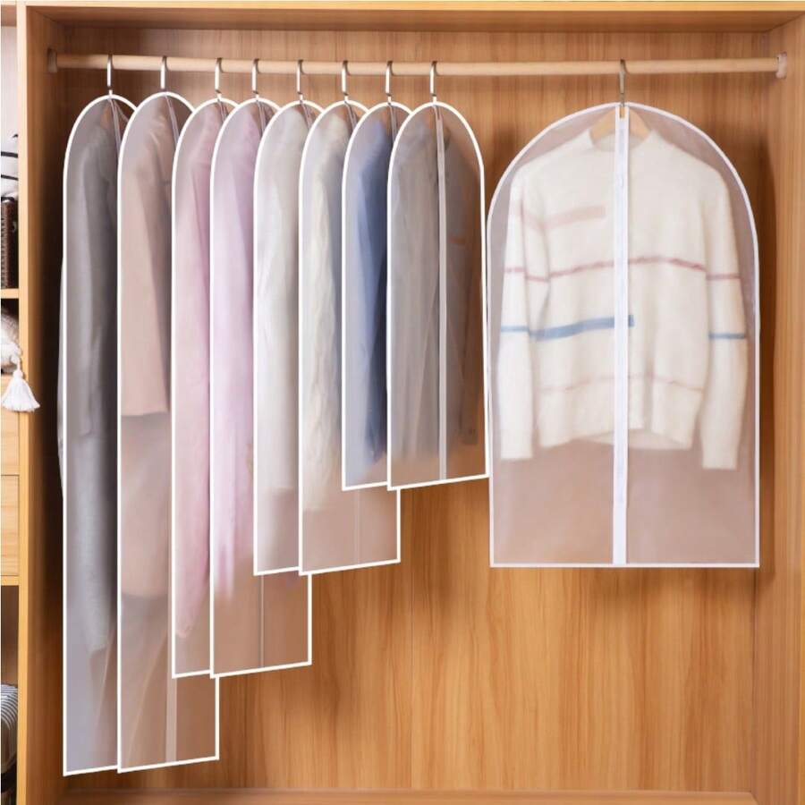 5 pieza Bolsa antipolvo para ropa, bolsillo colgante lavable y transparente, funda antipolvo para abrigo y traje, funda protectora para clasificar la ropa, bolsas colgantes para ropa con cremallera completa, cubiertas protectoras de prendas semi-transparentes para organización de armarios, materialresistente al polvo y el moho, adecuado para guardar ropa de temporada, ahorro de espacio y fácil de usar, protege la ropa del polvo, la humedad y las polillas, perfecto para el dormitorio, el organizador y el almacenamiento doméstico, 5 piezas Funda anti polvo para ropa, bolsa colgante anti polvo transparente para el hogar, funda anti polvo lavable para trajes, funda anti polvo completamente cerrada para abrigos y ropa gruesa para el hogar, decoración de dormitorio, organizador, almacenamiento doméstico, camiseta blanca de mujer, pantalones negros de mujer, ropa de invierno de señora, vestido, Juego de 5 fundas antipolvo para prendas - 60*80CM - Ver 1