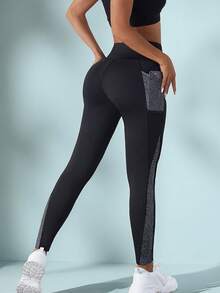 Leggings de yoga ajustados y cómodos para mujer con cintura elástica y bolsillo, con pespuntes de color contrastante, tirantes cruzados, todo a juego