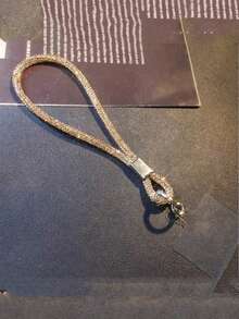 1条彩色水钻腕带挂绳，男女通用情侣款，耐用短款单扣手机挂绳，适合户外、旅行、运动、办公、学校、海滩、泳池等场合，兼容苹果、三星等手机，也可用于挂钥匙、身份证、零钱包、笔、蓝牙耳机、背包等，日常使用（带透明挂件）。兼容安卓及大多数智能手机，是送给母亲、家人、朋友、孩子、生日、节日的理想礼物。 - 彩色 - 查看 14