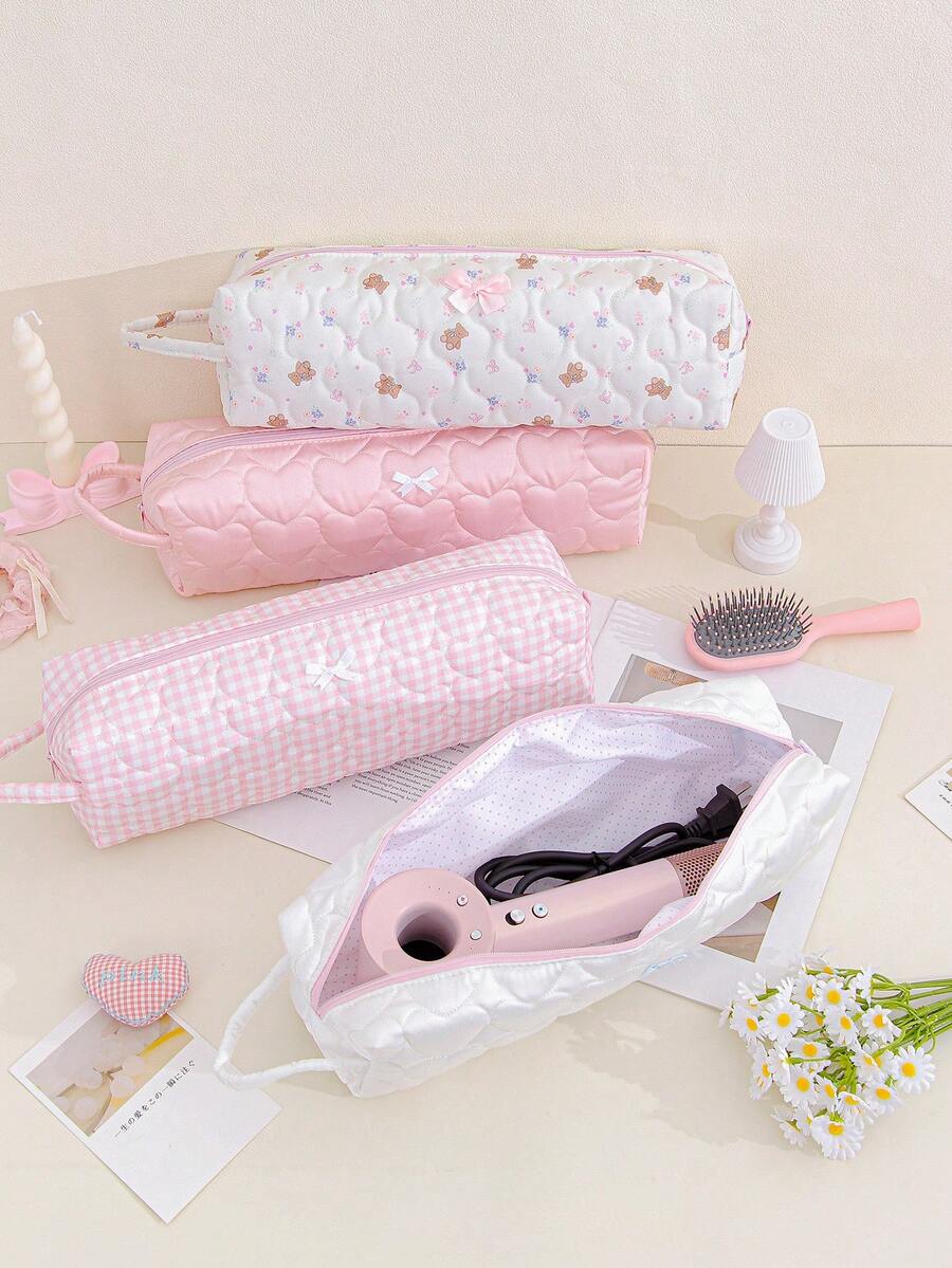 1个心形绗缝吹风机收纳袋，多功能收纳袋，可收纳卷发棒和吹风机配件，饰有可爱蝴蝶结和便携提手。非常适合旅行、收纳吹风机、口红、化妆刷和护肤品。居家必备，实用便捷，是收纳整理和旅行的理想之选。 - 彩色 - 查看 1
