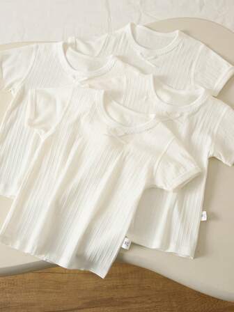 Set de 4 blusas de manga corta blancas sólidas para niñas, de algodón suave y cómodo, versátiles para primavera/verano