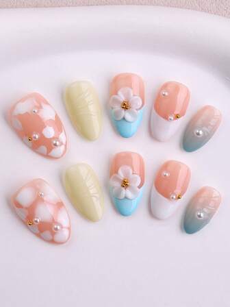 ロマンチックな雰囲気を演出する10個入りクラシックブルーグラデーションフレンチフレンチロングアーモンド手作りプレスオンネイルキット。真珠色のヌードカラーの3Dホワイトの花、フォーパール、小さな金のビーズ、雲とシェルのパターンの全カバー偽ネイル、人工ネイルチップが含まれています。ジェリーのり付きとネイルファイルも付属しています。簡単に適用と除去ができ、女性や女の子のバレンタインデーにおすすめです。