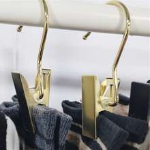 强力悬挂式衣夹，适用于家庭洗衣晾晒袜子和小件衣物，超强抓力，室内外均可使用，经久耐用，可重复使用，防止滑落和勾丝，是晾晒袜子、精致衣物、毛巾、内衣和轻薄衣物的理想之选，是洗衣房、阳台或杂物间的完美解决方案，便捷的多包装设计，助您快速有序地晾晒衣物。 - 彩色 - 查看 13