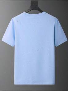 Esta nueva camiseta de manga corta para niña está hecha 100 % de algodón y luce un elegante estampado Pequeño pato amarillo. Es informal y versátil. Su tejido suave y agradable al tacto es delicado con la piel, lo que permite que las niñas se muevan con libertad y comodidad durante las reuniones familiares, los eventos escolares o los juegos al aire libre. - Azul - View 2