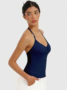 SUPEKYKO Top de yoga ajustable para mujer - Sujetador deportivo con espalda cruzada y pliegues, con almohadillas extraíbles, apto para entrenamiento y uso diario