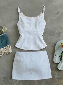 Bộ đồ nữ thời trang thường ngày mùa xuân/hè phối màu tương phản ngọt ngào họa tiết sọc xanh trắng ren, áo hai dây mùa hè mới, chân váy ngắn xẻ tà, trang trí nơ, bộ đồ đi nghỉ mát dễ thương cho bé gái. - Rửa nhẹ - Xem 4