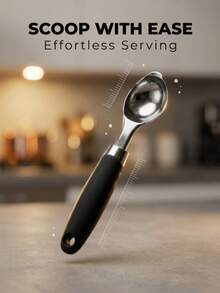 这款不锈钢勺子拥有光滑圆润的勺头，可以轻松舀取水果和冰淇淋球，不粘连。一体式结构经久耐用，易于清洗。防滑手柄握感舒适，挂孔设计方便收纳。它是制作甜点和摆盘水果的得力小工具。 - 黑色 - 查看 6