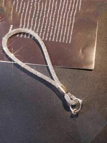 1条彩色水钻腕带挂绳，男女通用情侣款，耐用短款单扣手机挂绳，适合户外、旅行、运动、办公、学校、海滩、泳池等场合，兼容苹果、三星等手机，也可用于挂钥匙、身份证、零钱包、笔、蓝牙耳机、背包等，日常使用（带透明挂件）。兼容安卓及大多数智能手机，是送给母亲、家人、朋友、孩子、生日、节日的理想礼物。 - 彩色 - 查看 16