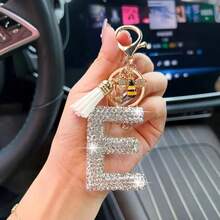 Llavero con letra blanca, accesorio brillante y lindo para mochila y llave de coche, cordón para mujeres y niñas - Plateado - Ver 20