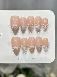 10 móng tay giả thủ công hình hạnh nhân, móng acrylic dán, cỡ trung bình, màu hồng nhạt, kiểu móng mắt mèo nổi bật, họa tiết chấm bi vẽ tay, đường kẻ bất đối xứng, đính nơ 3D ngọc trai nhỏ, kiểu móng mùa thu cá tính, thanh lịch, đơn giản, thích hợp cho tiệc tùng, hẹn hò, đi biển, nghỉ dưỡng nhiệt đới, tự làm móng nghệ thuật, thích hợp làm quà tặng cho phụ nữ và bé gái. - Hồng - Xem 3