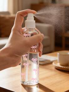 可重复使用的便携式喷雾瓶，饰有蝴蝶结和心形图案 - 适用于精油、香水、乳液、头发造型、清洁、植物浇水、面部喷雾、卸妆、发胶以及持续喷洒。非常适合旅行和出差。 - 彩色 - 查看 3