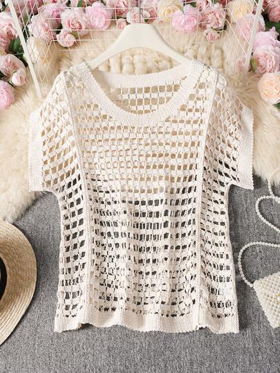 法式度假风镂空格纹短袖露脐针织上衣，适合海滩度假、春夏穿着