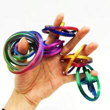 6/8 Anillos Juguete Fidget con Estructura Giratoria Multinivel, Alivio de Estrés para Escritorio, Regalo Creativo, Juguete Miniatura Coleccionable, Decoración de Escritorio Creativa - Multicolor - Ver 6