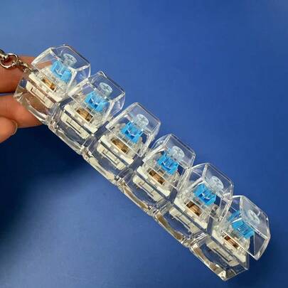 1 pieza Juguete de dedo para teclado, juguete antiestrés tipo apretón, llavero, alivio del estrés, regalo de llavero de dedo de teclado para amigos ansiosos, adecuado para oficina y teclado de hogar