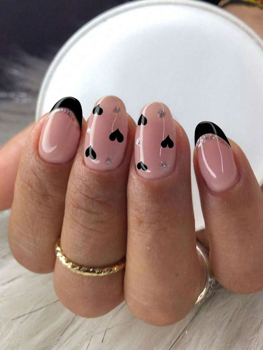 Bộ 24 miếng dán móng tay ngắn hình oval và trái tim lấp lấp lánh, đầu móng kiểu Pháp màu đen, vừa vặn hoàn hảo với móng giả acrylic ngắn, bao gồm: 1 miếng gel dẻo và 1 dũa móng, lý tưởng cho việc làm móng ngày Valentine, phù hợp cho phụ nữ và bé gái sử dụng hàng ngày và trong các bữa tiệc ngày Valentine. - Nhiều màu - Xem 1