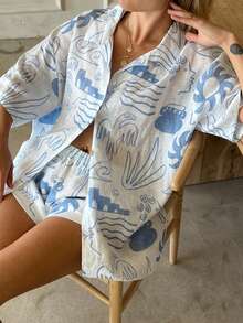 Nouveau style printemps/été vacances Ensemble 2 pièces avec blouse à col V à manches courtes imprimé océan + shorts à taille élastique imprimés, ambiance décontractée pour les vacances - Bleu et Blanc - Voir 5