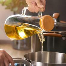 1个大容量硼硅酸盐玻璃油瓶，大容量，适合家庭厨房使用，带刻度尺，玻璃油瓶配备量杯和防溢油装置，调味瓶，适用于户外烧烤、露营、野餐、厨房用具、节日礼品。