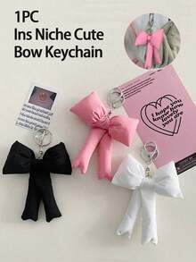 1个小众可爱蝴蝶结钥匙扣，高端手感包包挂件，少女背包装饰，轻巧易携，方便悬挂，可轻松挂在车钥匙、手提包、背包、钱包等物品上。 - 彩色 - 查看 2