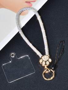 1 pièce Dragonne de téléphone de luxe pour femme en alliage brillant avec strass. Charm en métal avec empreinte de patte de chat sertie de cristaux strass amovible. Dragonne poignet créative et personnalisée, idéale comme porte-clés de voiture pour les voyages, le shopping, les cadeaux de printemps, anniversaire - Multicolore - Voir 23