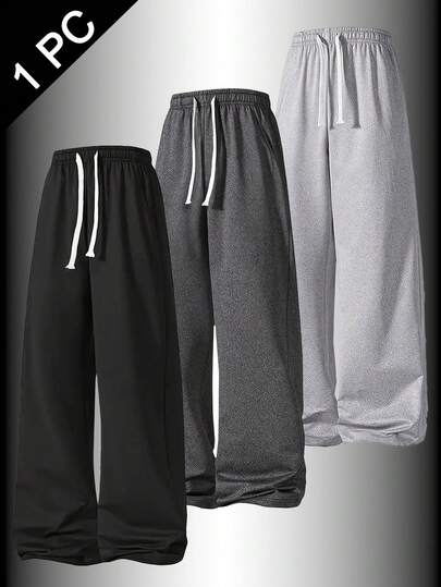 男士抽绳弹力腰宽松直筒休闲运动裤，适合日常休闲穿着、周末外出、朋友聚会、旅行及其他轻松的社交活动。是男士衣橱中不可或缺的百搭单品，也是送给男友或丈夫的绝佳礼物。