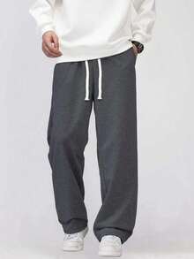 1件男士宽松休闲纯色阔腿运动裤，带抽绳腰带和大口袋，适合日常步行、工作、旅行和其他场合。 - 深灰色 - 查看 4