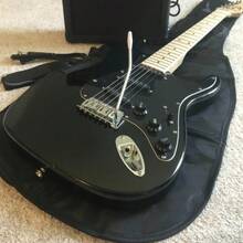 Full-Size Black Guitar Starter Package With 20-Watt Amp And Accessories - 1 - View 8