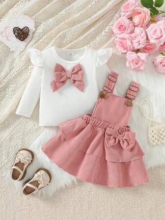 2 ชิ้น ชุดคริสต์มาสเด็กผู้หญิง, มินิมอล สไตล์น่ารัก เสื้อแขนกุดลายทางสีขาวหวาน พร้อมโบว์ 3D สีชมพูตกแต่ง และชุดกระโปรงสายโบว์เลเยอร์สีชมพู, ฤดูใบไม้ผลิ/ฤดูใบไม้ร่วง