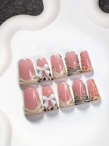 10件套极简亚克力美甲套装，包含法式假指甲、豹纹波浪美甲贴纸、蝴蝶结美甲装饰、棕色美甲胶水、香槟色水钻美甲贴纸，附赠美甲工具，3种尺寸可选，适合日常、派对、秋冬季节。 - 彩色 - 查看 2