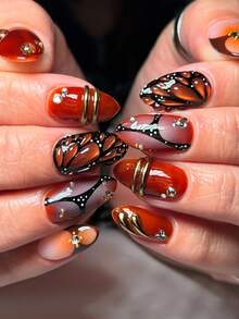 24 قطعة أظافر بشكل اللوز من الأكريليك للضغط والتركيب، مجموعة هدايا بلون أحمر كرزي، مثالية لرأس السنة والمناسبات اللافتة للنظر. تتميز بنقوش فراشات سوداء وحمراء ثلاثية الأبعاد، وتفاصيل ذهبية - متعدد الألوان - مشاهدة 1