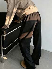 This Men's Casual Sweatpants Feature A Loose, Straight-Leg Silhouette With A Thermal Lined For Comfort And Drape. Suitable For Both Indoor And Outdoor Wear, It Also Makes A Great Gift For Couples. The Pants Are Made Of 100% Polyester Fabric And Have A Drawstring Waistband For Adjustable Fit, Available In Multiple Colors. - Black - View 9