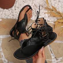 Sandalias romanas de mujer con tacón bajo, con cordones y cremallera en la parte trasera - Negro - Ver 1