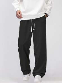 This Men's Casual Sweatpants Feature A Loose, Straight-Leg Silhouette With A Thermal Lined For Comfort And Drape. Suitable For Both Indoor And Outdoor Wear, It Also Makes A Great Gift For Couples. The Pants Are Made Of 100% Polyester Fabric And Have A Drawstring Waistband For Adjustable Fit, Available In Multiple Colors. - Black - View 5