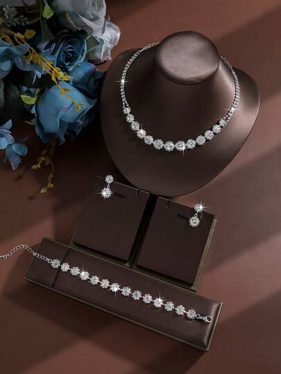 4 piezas Conjunto de joyería de collar, aretes y pulsera con rhinestones de lujo, accesorios elegantes y versátiles adecuados para uso diario, bodas, fiestas y como regalo para mujeres