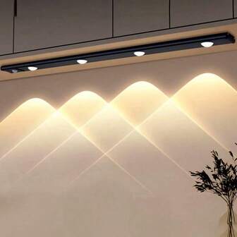 Barra de luz LED con sensor de movimiento moderno, adecuada para armario de zapatos, armario de exhibición, armario, cocina, armario inteligente - Efecto triangular, sin necesidad de cableado, fácil instalación, recargable por USB, material de plástico, superficie pintada, control de botón, regulable, luz LED de decoración del hogar, iluminación inteligente