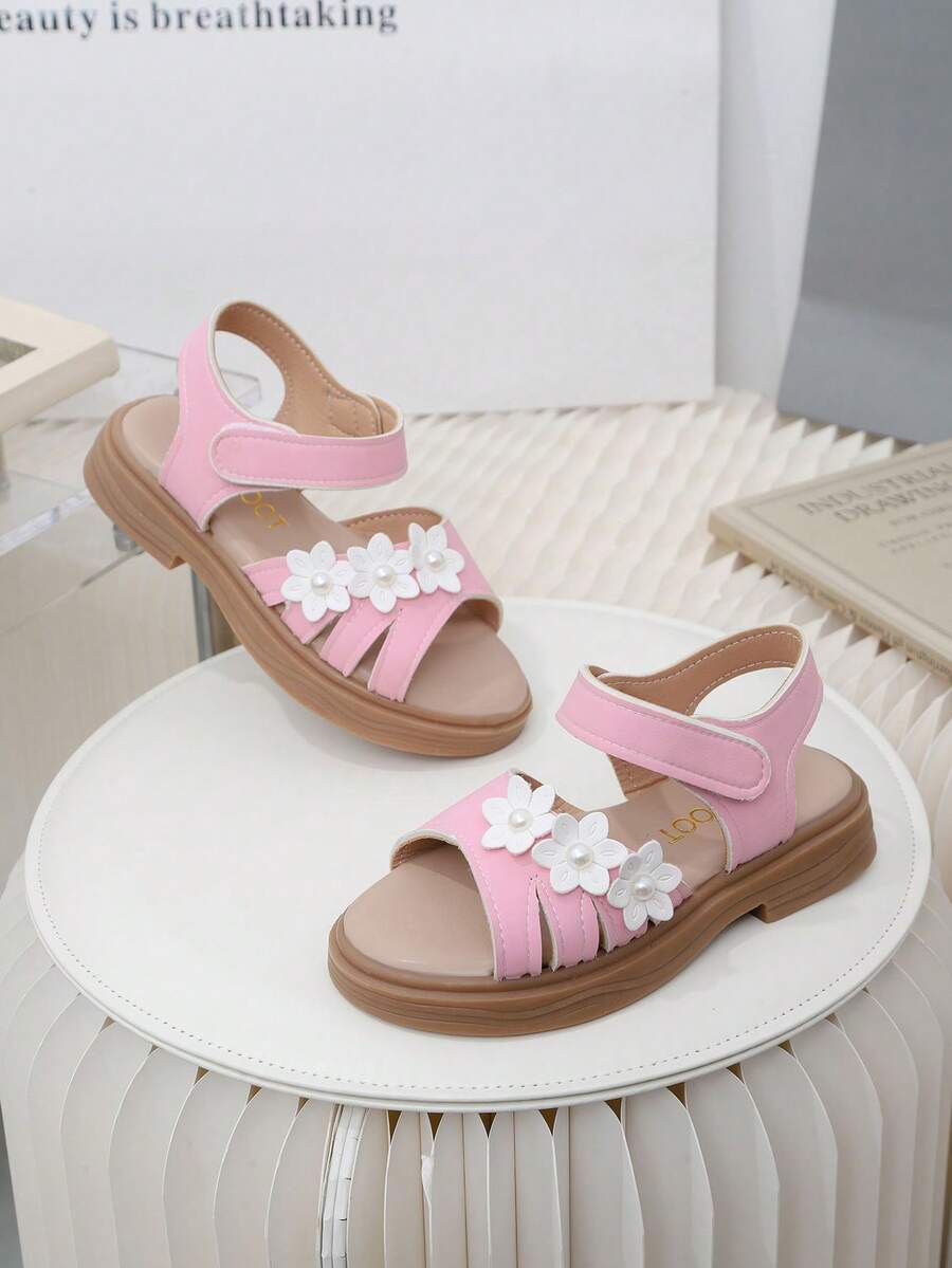 Một đôi dép xăng đan trẻ em mùa hè mới nhất, màu hồng, đính ngọc trai trắng, kiểu dáng móc dán, lựa chọn tuyệt vời cho việc đi mua sắm trong trung tâm thương mại, đi chơi hàng ngày, kỳ nghỉ hè và dạo chơi công viên, thời trang, thoải mái và dễ chịu. - Hồng - Xem 1