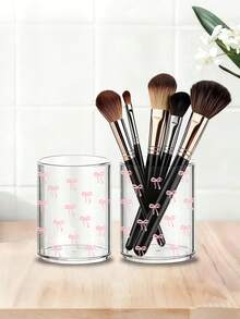 Modischer rosa Schleifen-Muster runder Acryl-Aufbewahrungsbehälter, Make-up Pinselhalter, Stift- & Kosmetikpinsel-Organizer, geeignet für Zuhause, Schule und Büro. Kompakt, multifunktional und tragbar, kann zum Aufbewahren von Wattestäbchen, Pinseln, Toilettenartikeln, Kosmetika, Schmuck und mehr verwendet werden. - Verschiedenfarbig - Übersicht 1